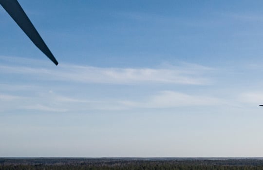 Wind turbines, blue skies